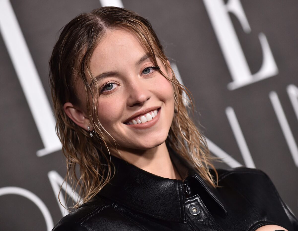 Sydney Sweeney at an Elle Event with a big smile.